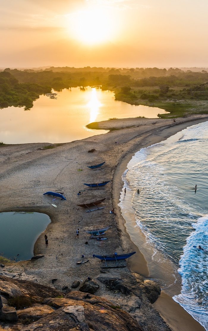 Sunrise over the lagoon and sandbar at Arugam Bay