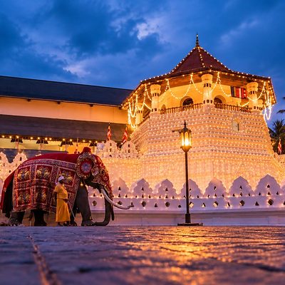 The Temple of the Tooth lit at dusk, Kandy, Sri Lanka