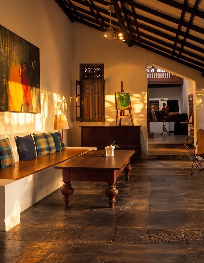The gallery room at Barefoot in Colombo, with textiles and a long communal table
