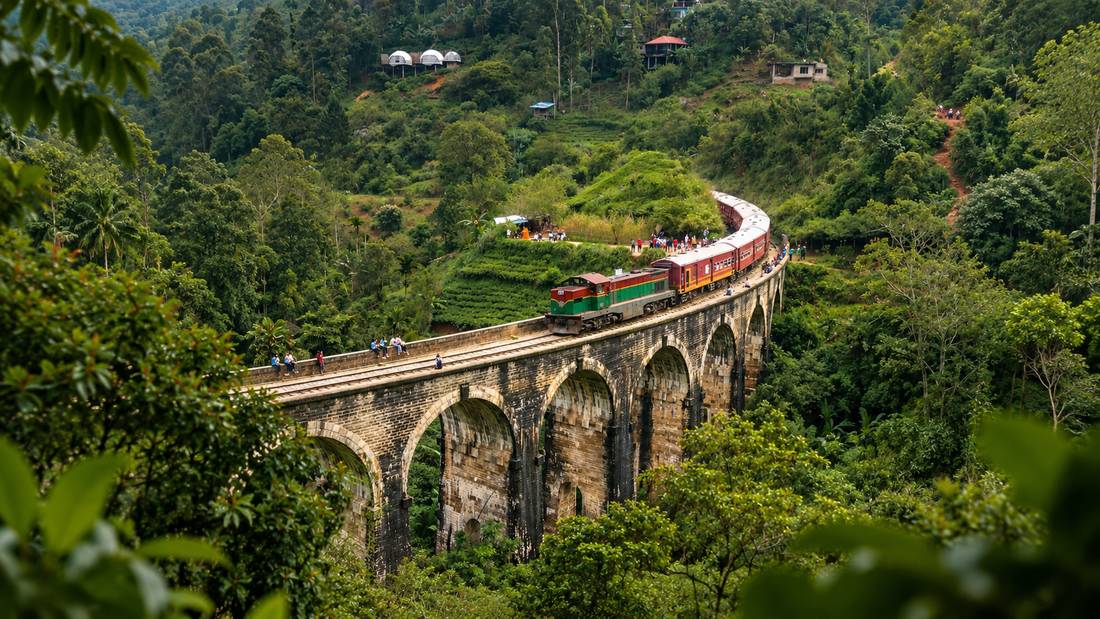 The blue train crossing the Nine Arch Bridge