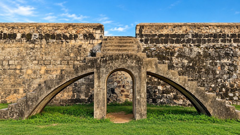 A stone archway and steps set into the rampart wall of Jaffna Fort, Sri Lanka
