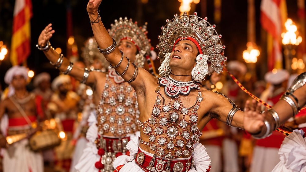 A Kandyan dancer in full ves costume with silver headdress, Kandy, Sri Lanka