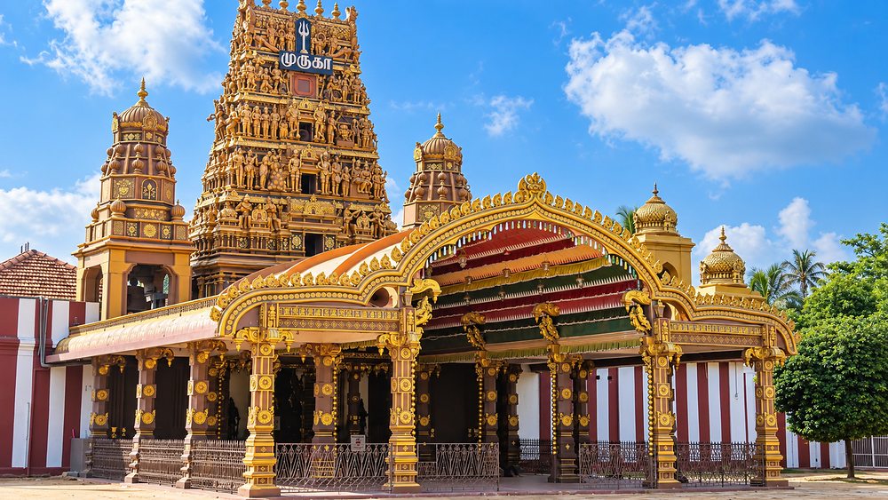 The golden pillared mandapam and carved gopuram of Nallur Kandaswamy Kovil, Jaffna, Sri Lanka