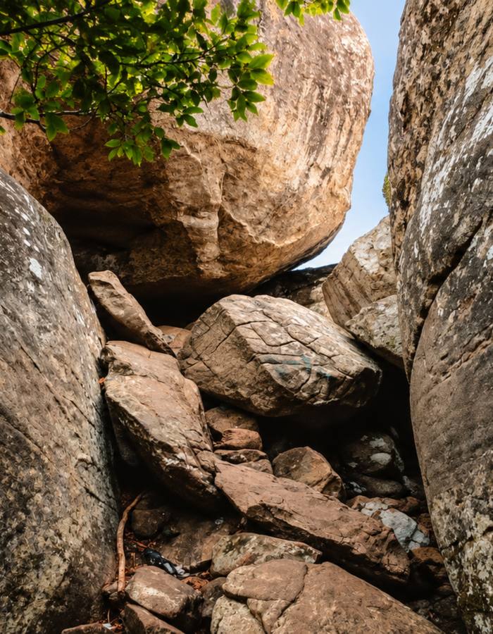 The boulder scramble near the top of Pidurangala, where the path becomes a climb