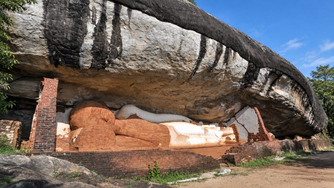 The reclining Buddha in the rock shelter at Pidurangala, Sri Lanka