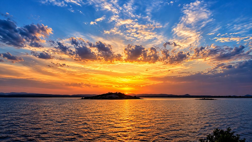 Sunset over the reservoir at Polonnaruwa