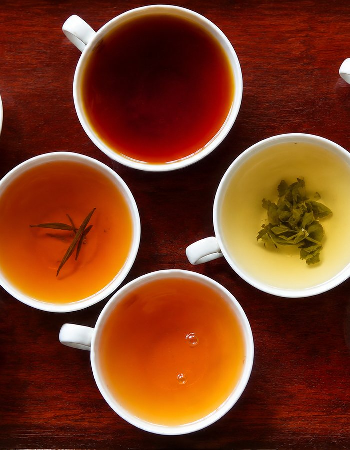 A tasting tray of Ceylon tea grades poured on a working estate