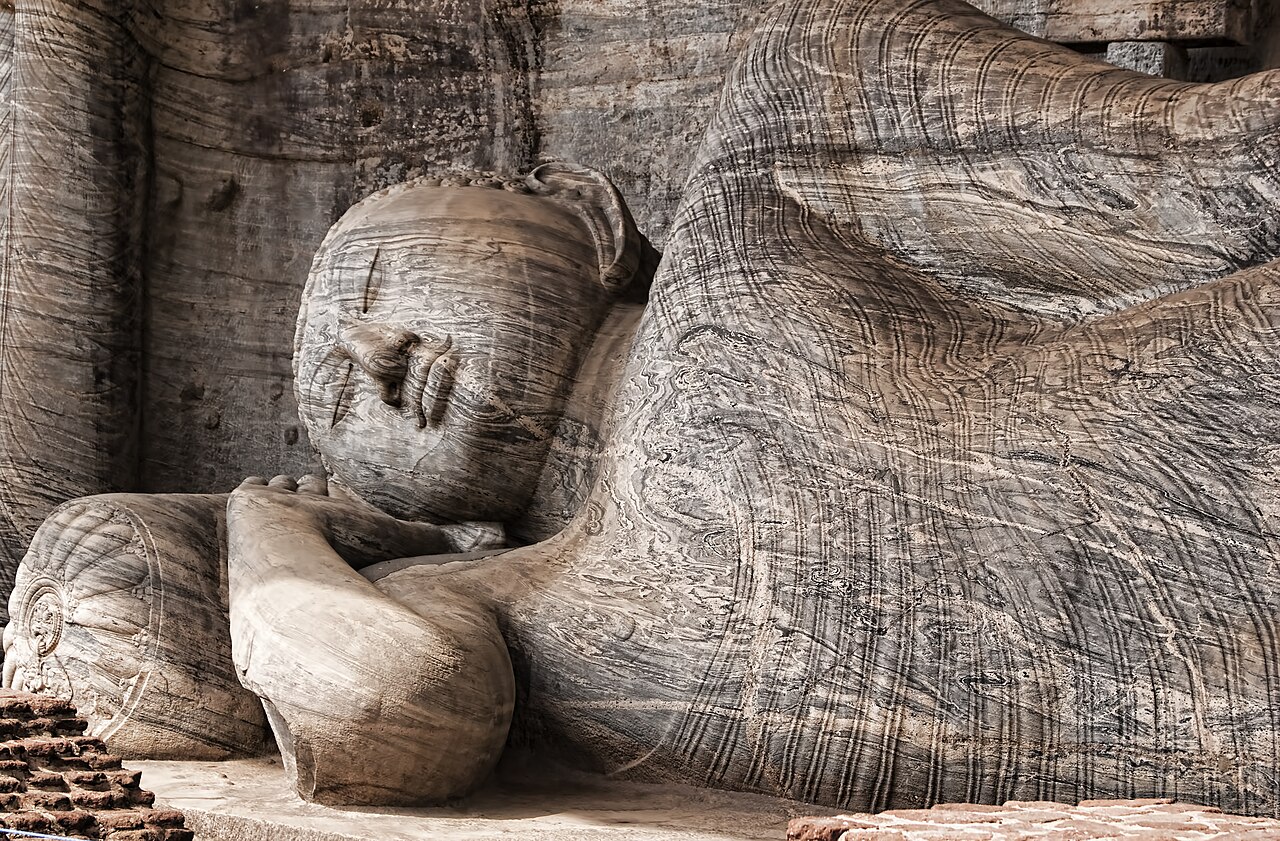 Ancient carved Buddha statue at Polonnaruwa, Sri Lanka